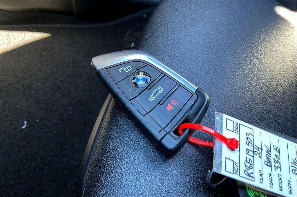 used 2024 BMW 330e car, priced at $29,892