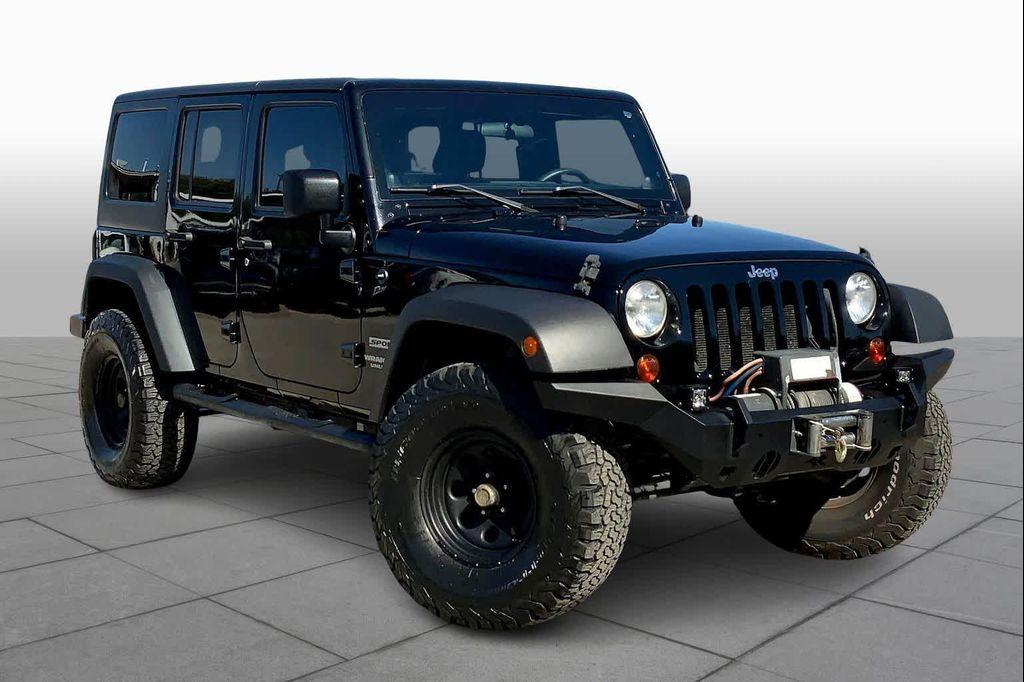 used 2011 Jeep Wrangler Unlimited car, priced at $13,804
