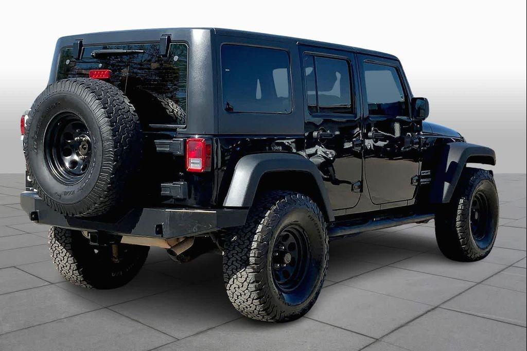 used 2011 Jeep Wrangler Unlimited car, priced at $13,804
