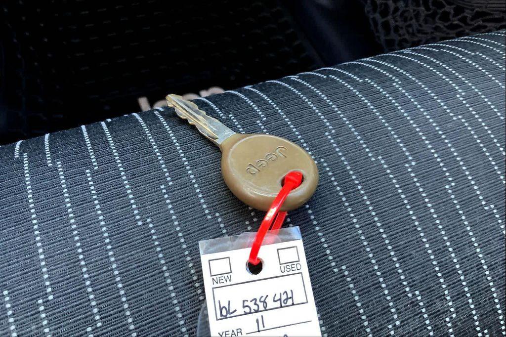 used 2011 Jeep Wrangler Unlimited car, priced at $13,804