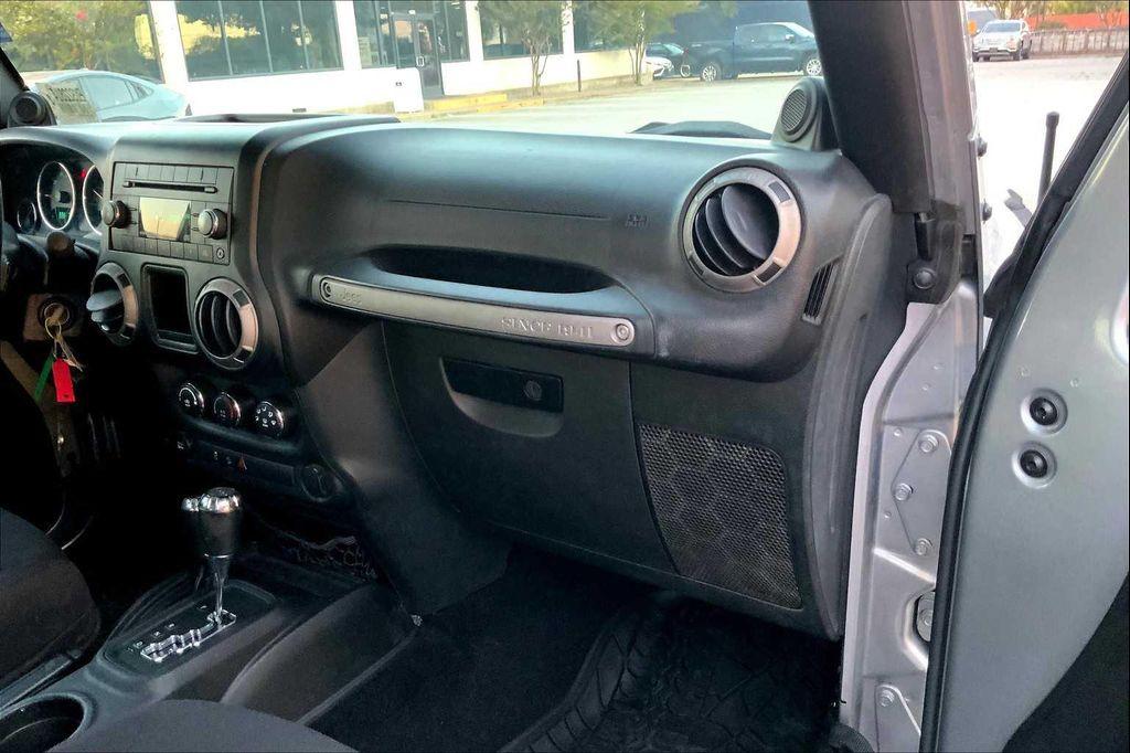 used 2014 Jeep Wrangler Unlimited car, priced at $16,899