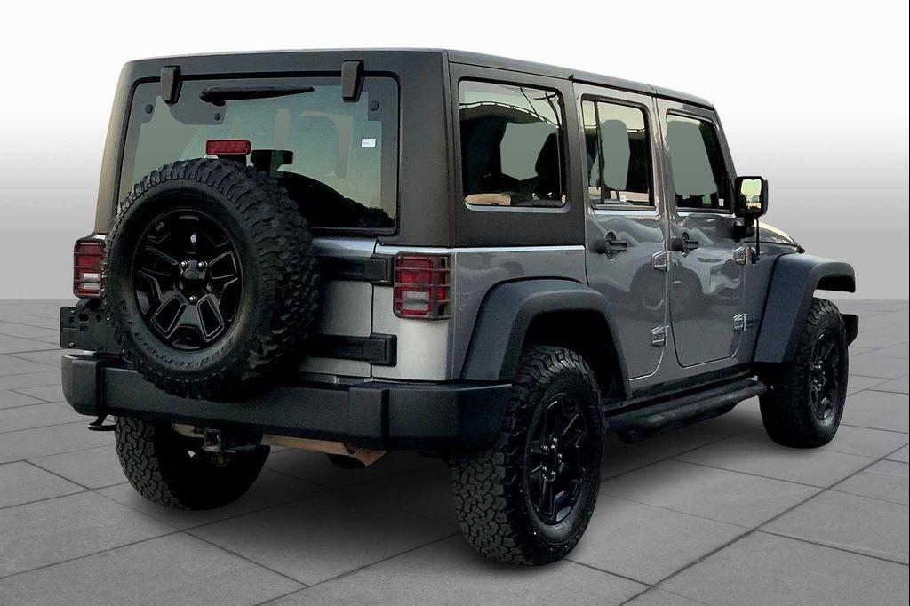 used 2014 Jeep Wrangler Unlimited car, priced at $16,899