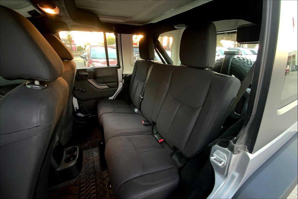 used 2014 Jeep Wrangler Unlimited car, priced at $16,899