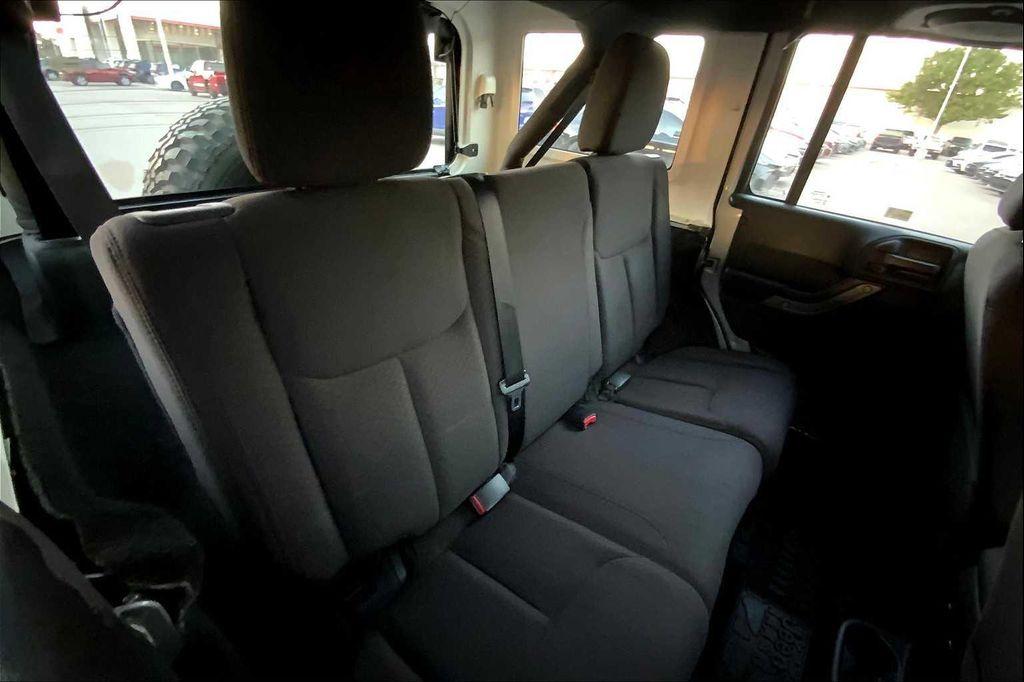 used 2014 Jeep Wrangler Unlimited car, priced at $16,899