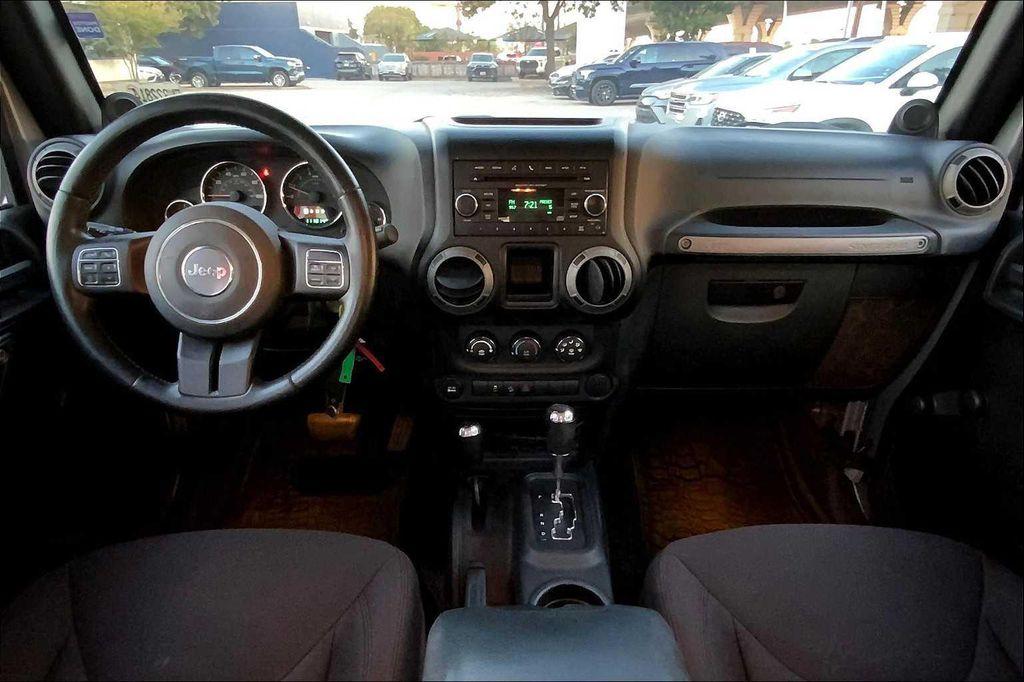used 2014 Jeep Wrangler Unlimited car, priced at $16,899
