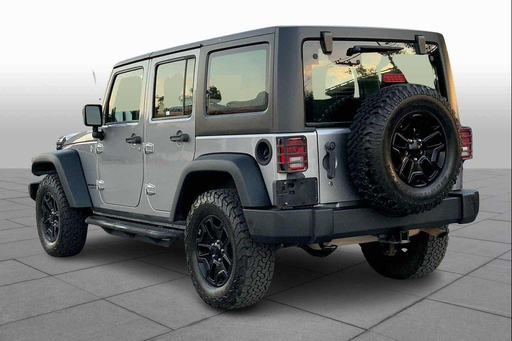 used 2014 Jeep Wrangler Unlimited car, priced at $16,899