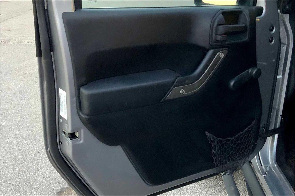 used 2014 Jeep Wrangler Unlimited car, priced at $16,899