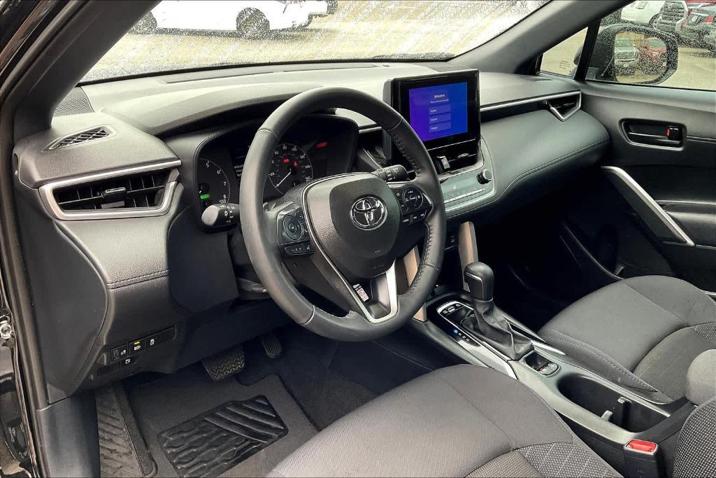 used 2024 Toyota Corolla Cross Hybrid car, priced at $32,898