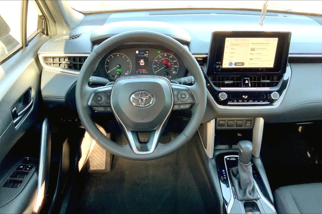 used 2024 Toyota Corolla Cross Hybrid car, priced at $32,140