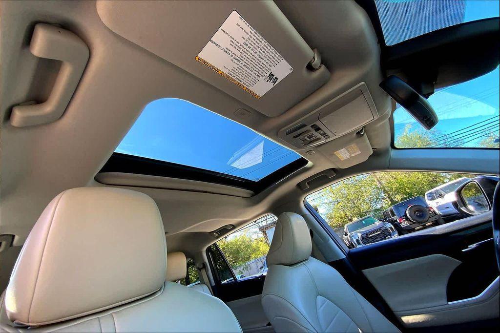 used 2023 Toyota Highlander car, priced at $36,956