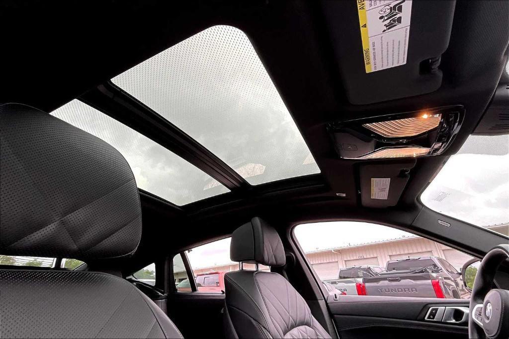 used 2023 BMW X6 car, priced at $64,898
