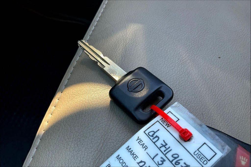 used 2013 Nissan Frontier car, priced at $15,798