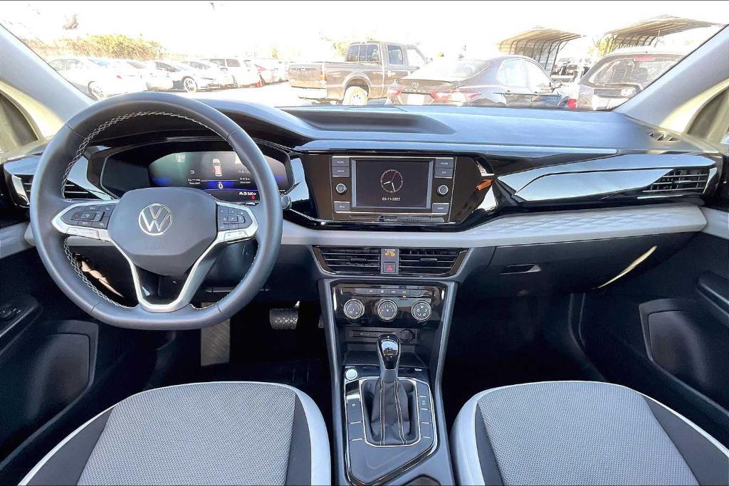 used 2024 Volkswagen Taos car, priced at $20,922