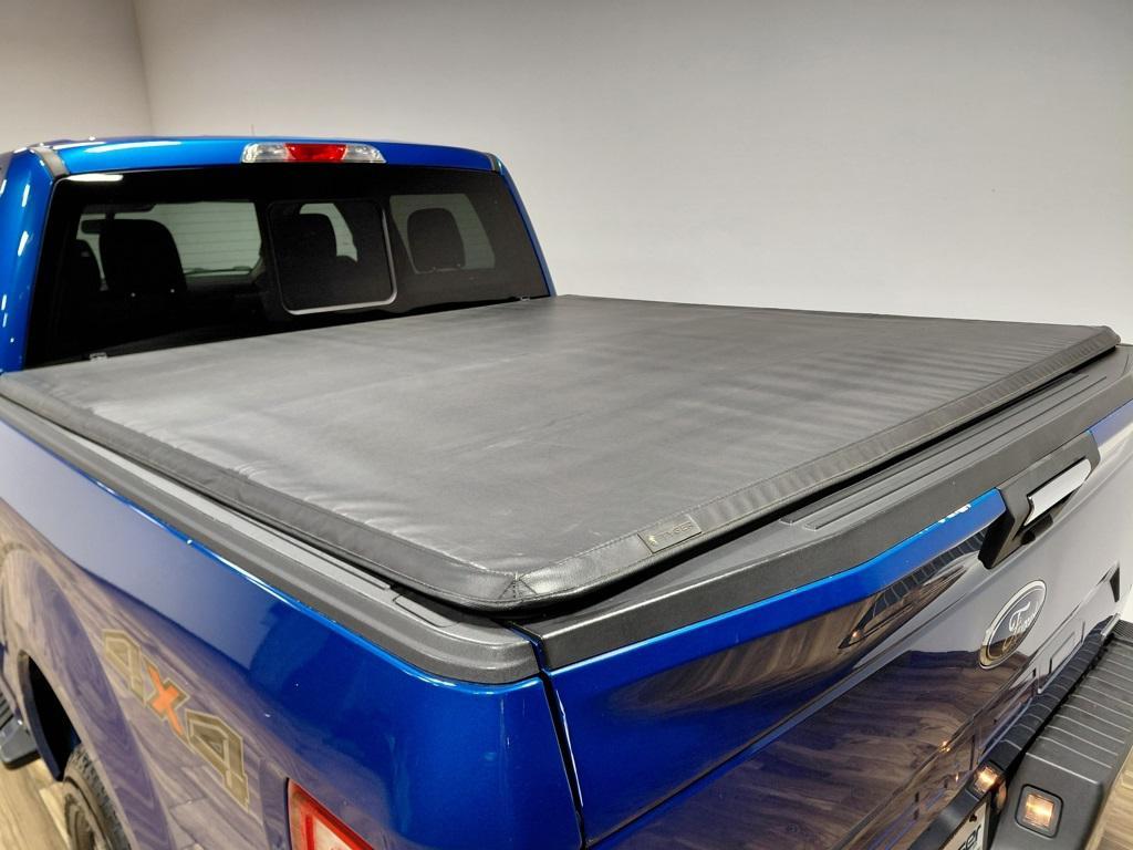 used 2018 Ford F-150 car, priced at $23,394