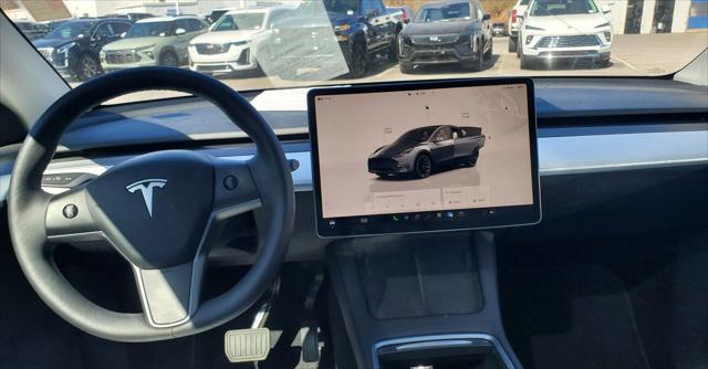 used 2023 Tesla Model Y car, priced at $33,000