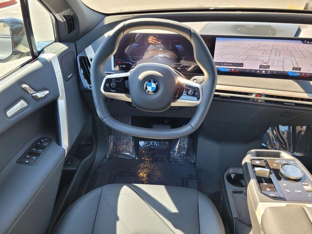 new 2026 BMW iX car, priced at $82,570