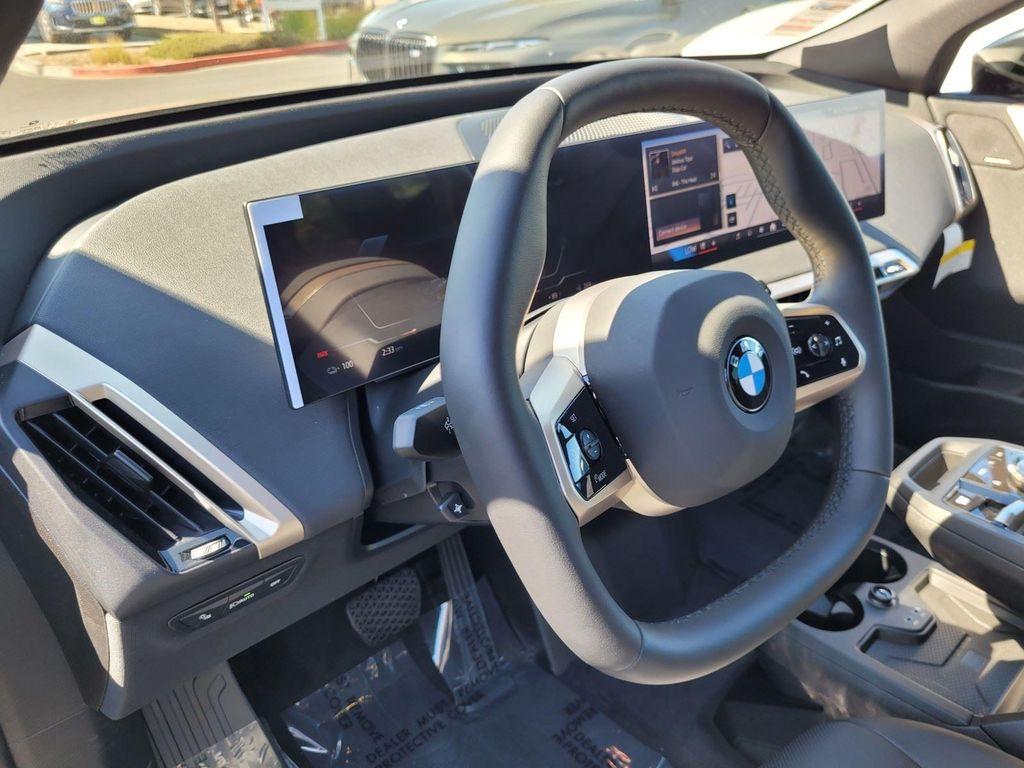 new 2026 BMW iX car, priced at $82,570