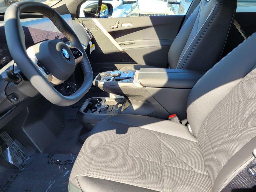new 2026 BMW iX car, priced at $82,570