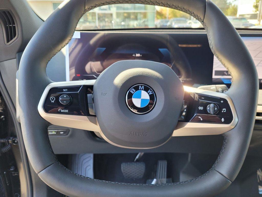new 2026 BMW iX car, priced at $82,570
