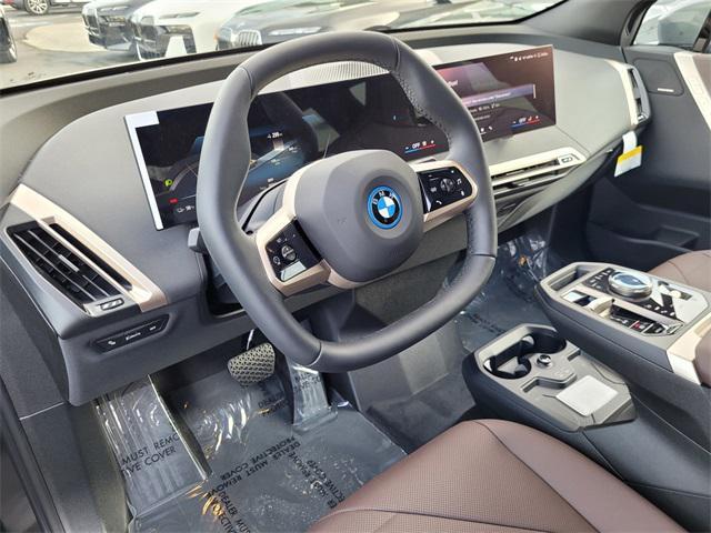 new 2025 BMW iX car, priced at $93,075