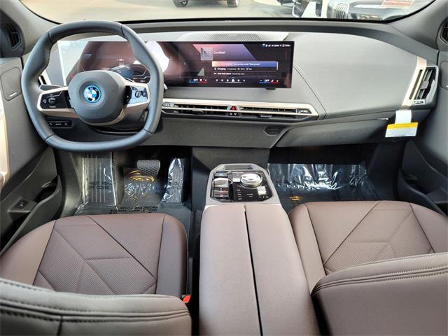 new 2025 BMW iX car, priced at $93,075