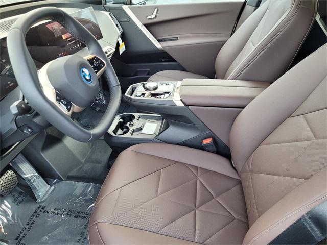 new 2025 BMW iX car, priced at $93,075