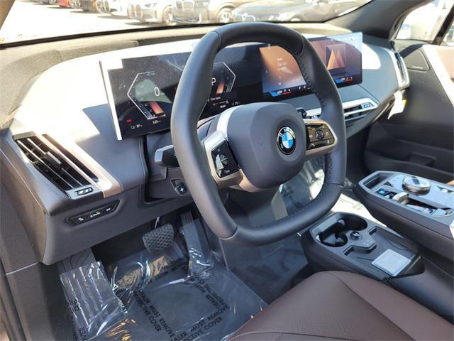 new 2026 BMW iX car, priced at $85,020
