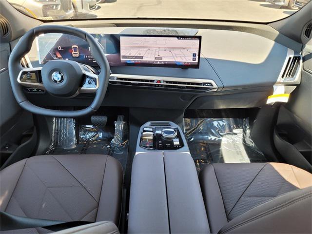 new 2026 BMW iX car, priced at $85,020