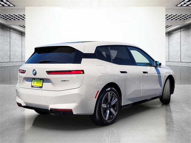 new 2026 BMW iX car, priced at $85,020