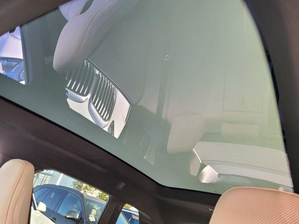 new 2026 BMW iX car, priced at $93,020