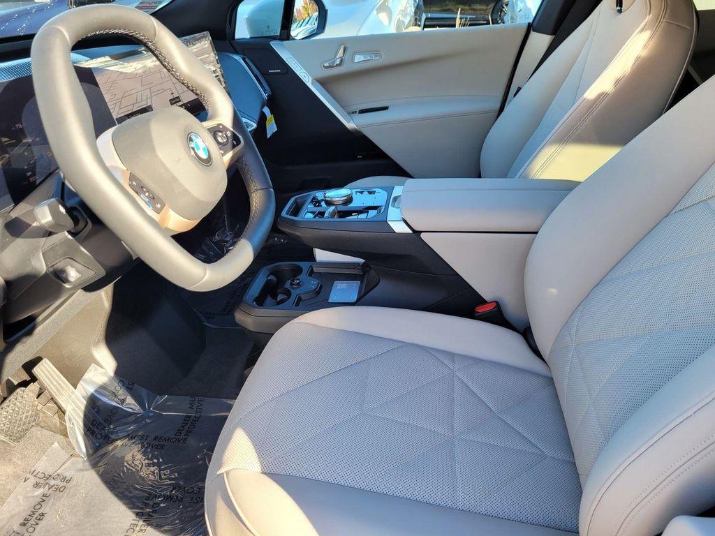 new 2026 BMW iX car, priced at $93,020