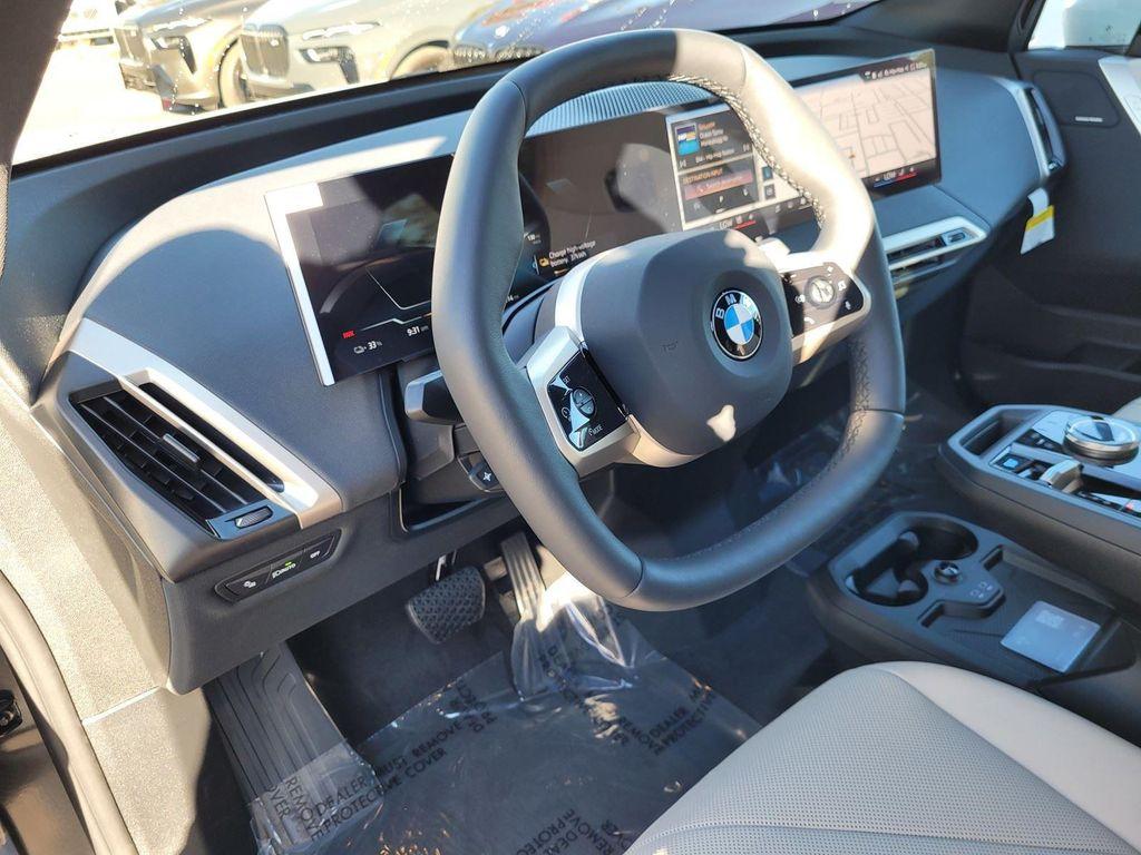 new 2026 BMW iX car, priced at $93,020