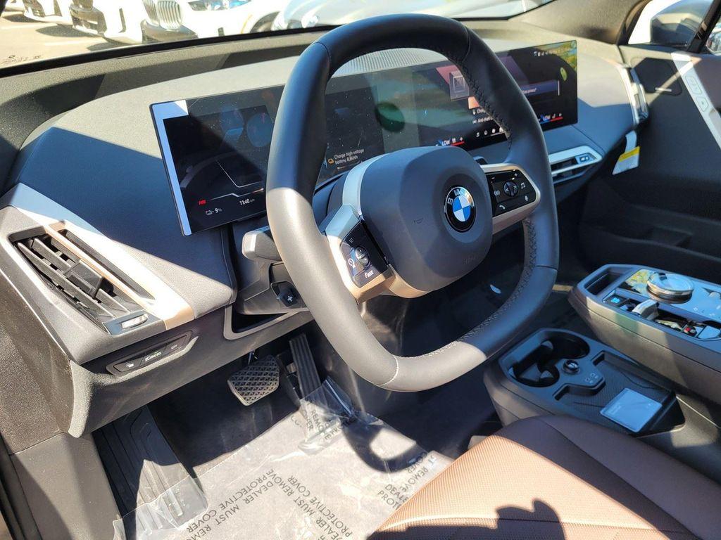 new 2026 BMW iX car, priced at $83,270