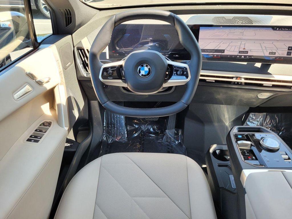 new 2026 BMW iX car, priced at $83,270