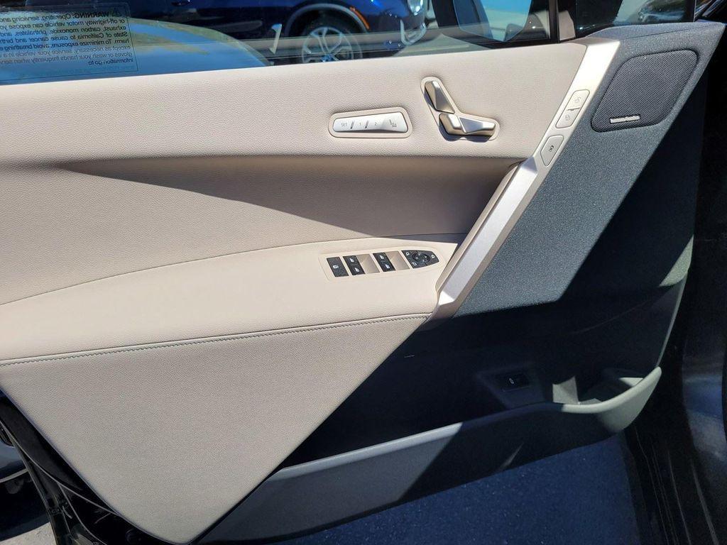 new 2026 BMW iX car, priced at $83,270