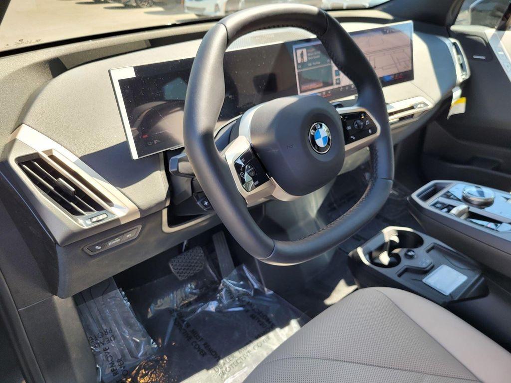 new 2026 BMW iX car, priced at $83,270