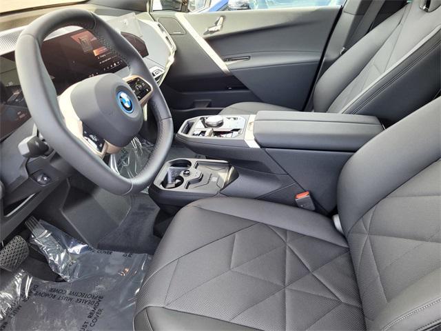 new 2025 BMW iX car, priced at $94,005