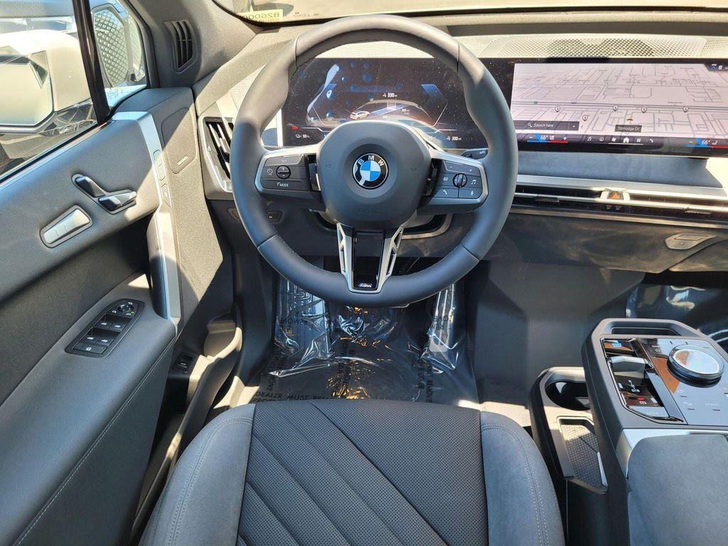 new 2026 BMW iX car, priced at $100,670