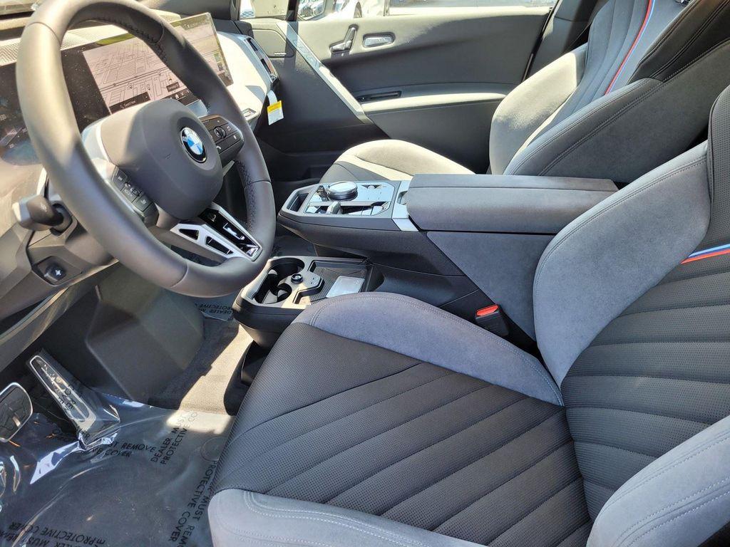 new 2026 BMW iX car, priced at $100,670