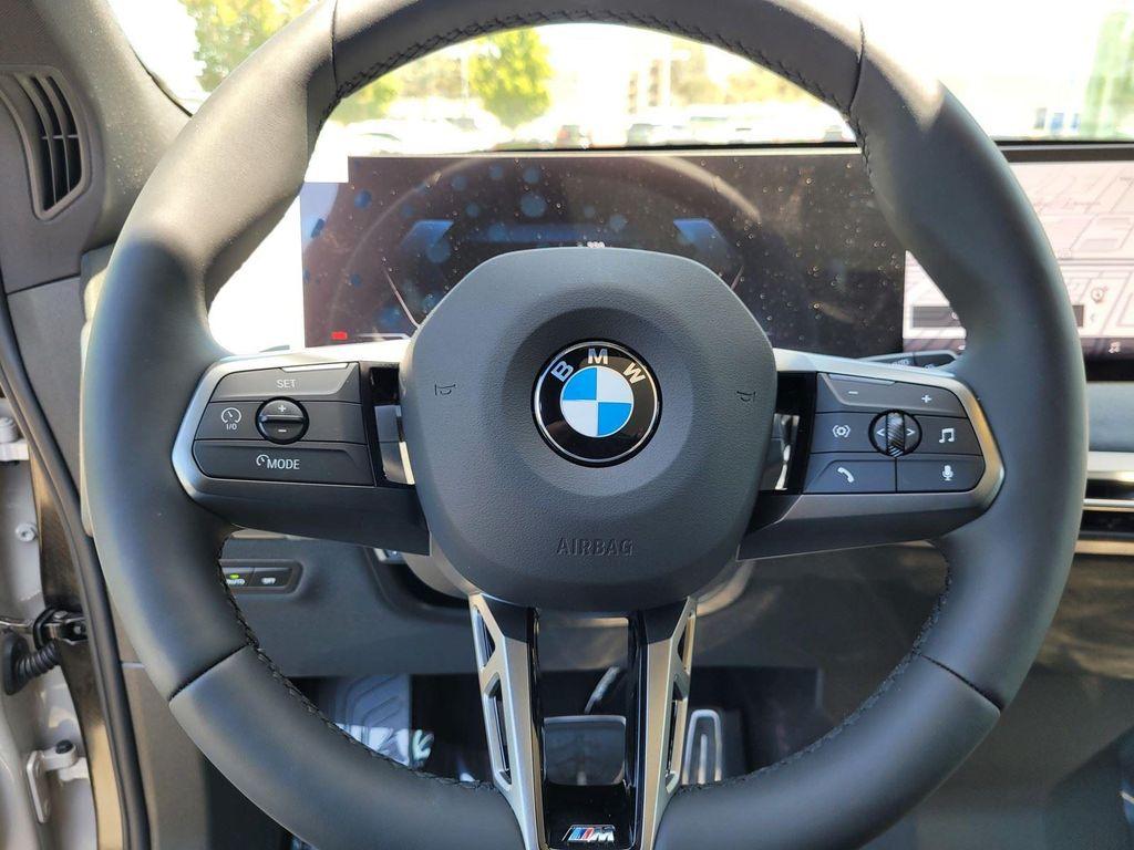 new 2026 BMW iX car, priced at $100,670