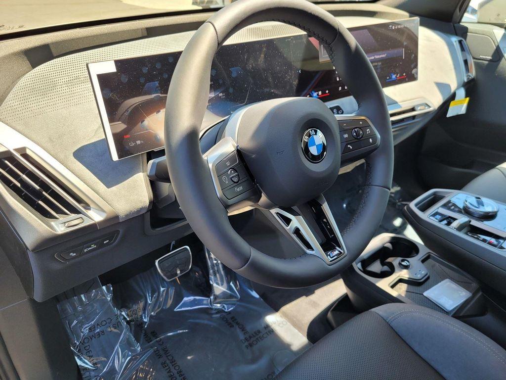 new 2026 BMW iX car, priced at $100,670