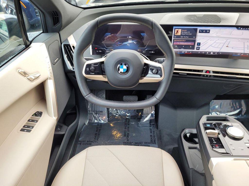 new 2026 BMW iX car, priced at $93,170