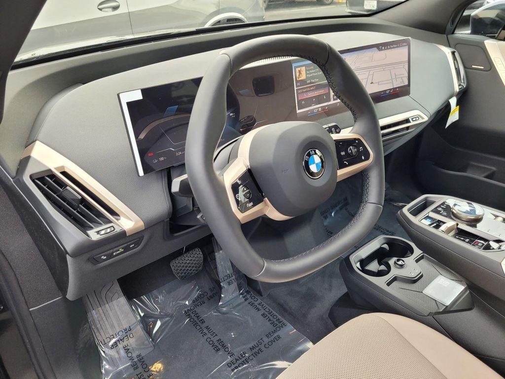 new 2026 BMW iX car, priced at $93,170