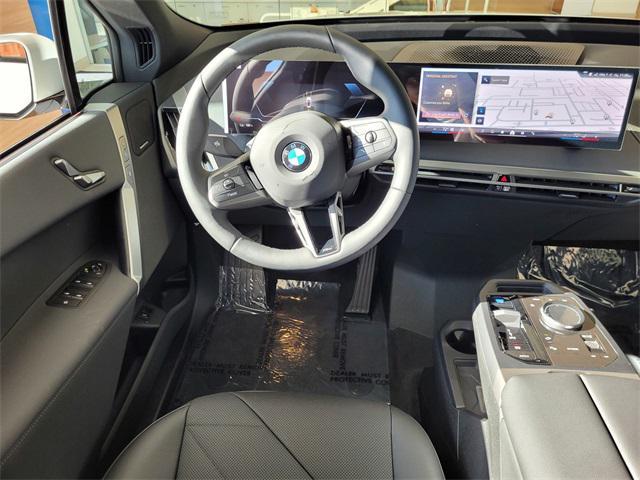 new 2025 BMW iX car, priced at $94,455