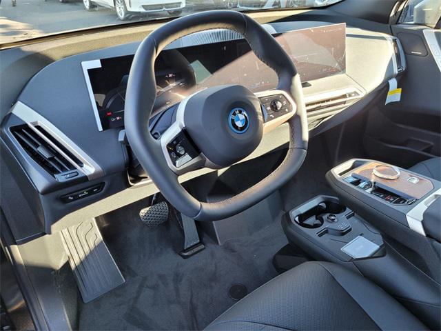 new 2025 BMW iX car, priced at $98,030