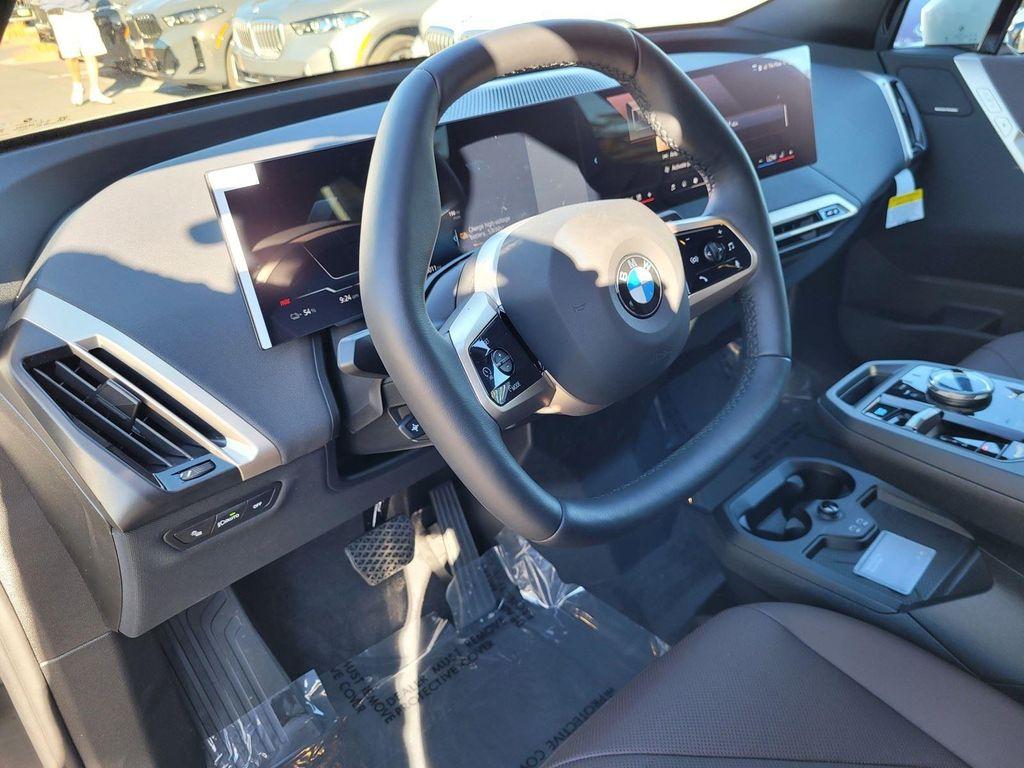 new 2026 BMW iX car, priced at $82,445