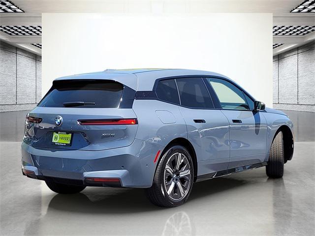 new 2026 BMW iX car, priced at $85,395