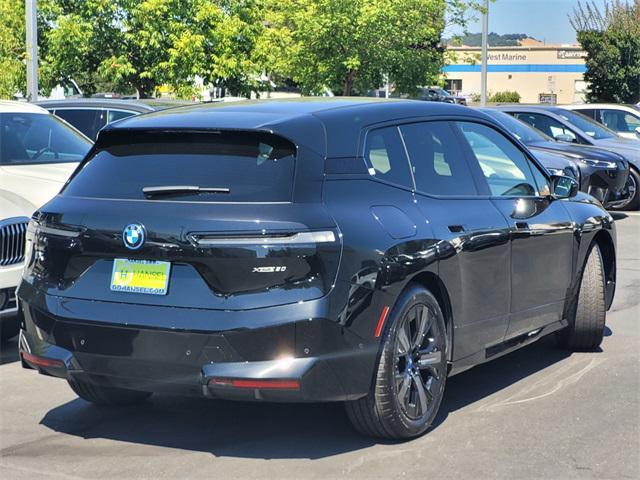 new 2025 BMW iX car, priced at $102,145