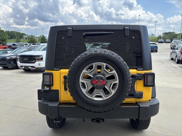 used 2015 Jeep Wrangler Unlimited car, priced at $17,038