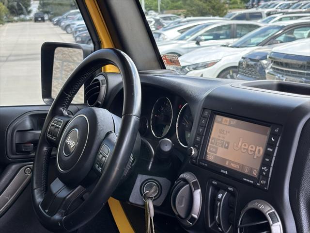 used 2015 Jeep Wrangler Unlimited car, priced at $17,038
